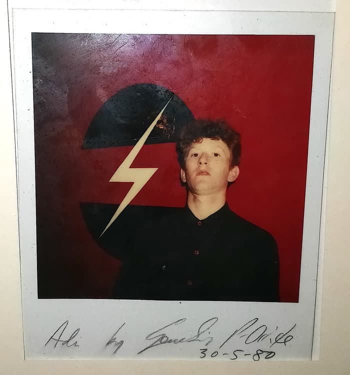 Adi Newton in front of TG Symbol