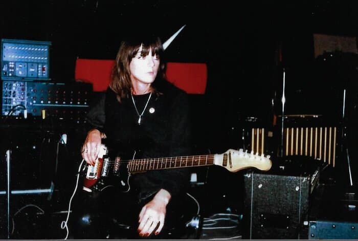 Cosey with guitar